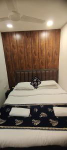 Postel nebo postele na pokoji v ubytování Hotel Fortune