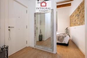 Posteľ alebo postele v izbe v ubytovaní Apartaments Ca la Somiada