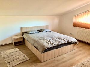 Postel nebo postele na pokoji v ubytování Casa Dima