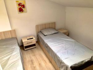 Postel nebo postele na pokoji v ubytování Casa Dima