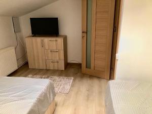 Postel nebo postele na pokoji v ubytování Casa Dima