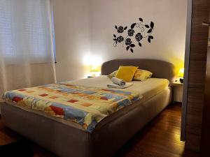 a bedroom with a bed in a room at Apartment Karma in Zadar