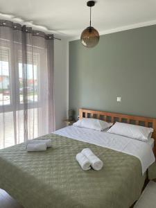 Postel nebo postele na pokoji v ubytování Apartman Stela