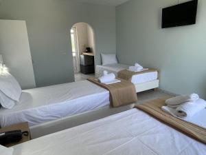 Postel nebo postele na pokoji v ubytování Armonia Hotel by Zante Plaza