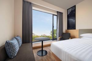 Postel nebo postele na pokoji v ubytování Fairfield by Marriott Jaipur