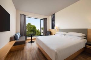 Postel nebo postele na pokoji v ubytování Fairfield by Marriott Jaipur