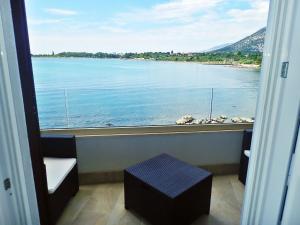 a view of the ocean from a room with a window at Plava Laguna with beautiful seaview in Seline