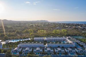 an aerial view of a building with a resort at Kairaba Sandy Villas - Adults Only in Agios Georgios