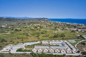an aerial view of a resort near the ocean at Kairaba Sandy Villas - Adults Only in Agios Georgios