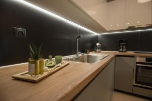 Kuchyň nebo kuchyňský kout v ubytování Maistros Home