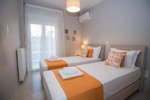 Postel nebo postele na pokoji v ubytování Maistros Home