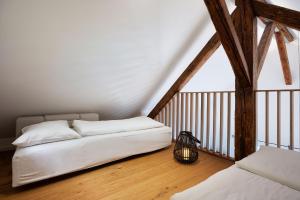 Postelja oz. postelje v sobi nastanitve Private beach house on Lake Bled
