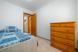 Postel nebo postele na pokoji v ubytování Hauzify I Apartament Pau Casals