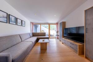 TV a/nebo společenská místnost v ubytování Appartement Gernkogelblick + 8 fotografií