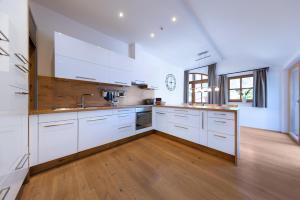 Kuchyň nebo kuchyňský kout v ubytování Appartement Gernkogelblick