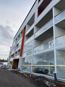 a large building with a lot of glass windows at TUUSULA Tuusula 15 min drive to Airport in Tuusula