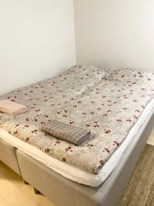 Postel nebo postele na pokoji v ubytování PEURANIITTY-1 New modern apartment