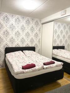 Кровать или кровати в номере VUOSAARI-2 Pure luxury for 100 m2 in Vuosaari +11 фотографий