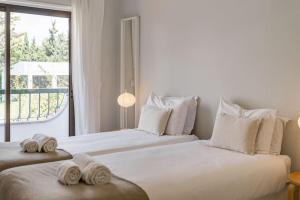 Postel nebo postele na pokoji v ubytování Tailor Made Villa with Ocean View in Caxias