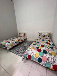 Lova arba lovos apgyvendinimo įstaigoje Rumah 127 - Homestay Taiping