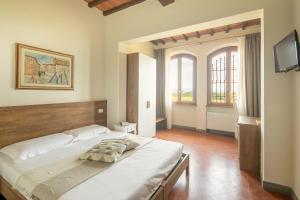 Podere La Quercia客房内的一张或多张床位