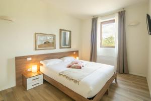 Podere La Quercia客房内的一张或多张床位