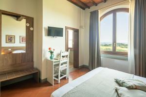Podere La Quercia客房内的一张或多张床位