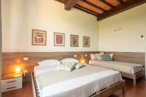 Podere La Quercia客房内的一张或多张床位
