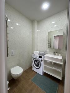 Koupelna v ubytování Modern apartament + 37 fotografií