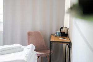 Posteľ alebo postele v izbe v ubytovaní Hotel Arko