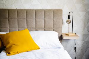 Posteľ alebo postele v izbe v ubytovaní Hotel Arko