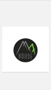 a house logo with mountains and a green arrow at M7 House in Gorists'ikhe