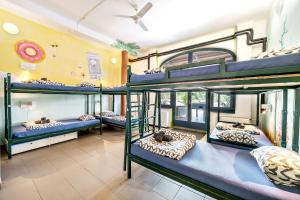 a group of bunk beds in a room at Island Hostel Budapest in Budapest