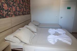 Krevet ili kreveti u jedinici u okviru objekta HN-Hotel Natal Penha