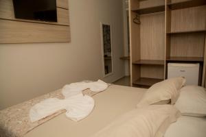 Krevet ili kreveti u jedinici u okviru objekta HN-Hotel Natal Penha