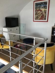 Telewizja i/lub zestaw kina domowego w obiekcie Gruissan
