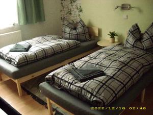 Postel nebo postele na pokoji v ubytování scheels-ferienwohnung