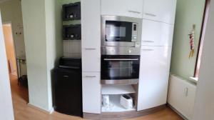 Kuchyň nebo kuchyňský kout v ubytování scheels-ferienwohnung
