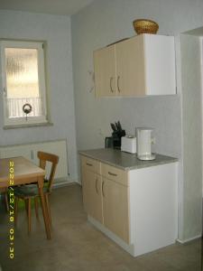 Kuchyň nebo kuchyňský kout v ubytování scheels-ferienwohnung