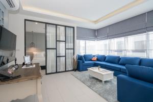 Posezení v ubytování Palmyrah Surin Beach Residence