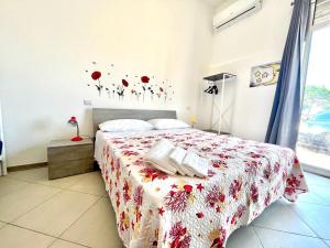 Кровать или кровати в номере Casamare 2