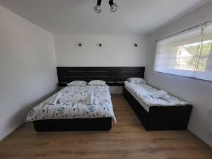 Postel nebo postele na pokoji v ubytování Apartment Dado