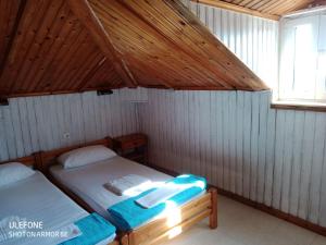 Postel nebo postele na pokoji v ubytování Oasis - Harbor House