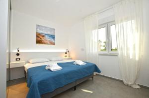 Ένα ή περισσότερα κρεβάτια σε δωμάτιο στο Villa 5H +64 φωτογραφίες