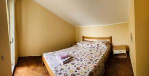 Postel nebo postele na pokoji v ubytování Rafailovici Holiday Apartments