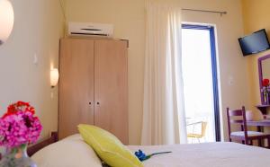 Postel nebo postele na pokoji v ubytování Oasis - Harbor House