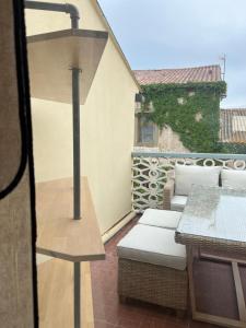 Balkón nebo terasa v ubytování Maison Emile - Coeur du village - 8 personnes - Clim - Superbe literie