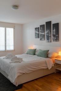 Cama o camas de una habitación en Los Lorentes Residences Bulle