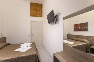 TV a/nebo společenská místnost v ubytování Hotel Orbis