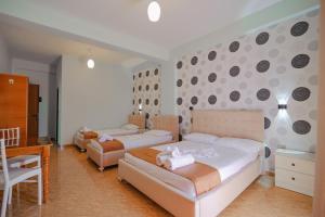 Postel nebo postele na pokoji v ubytování Hotel Panorama